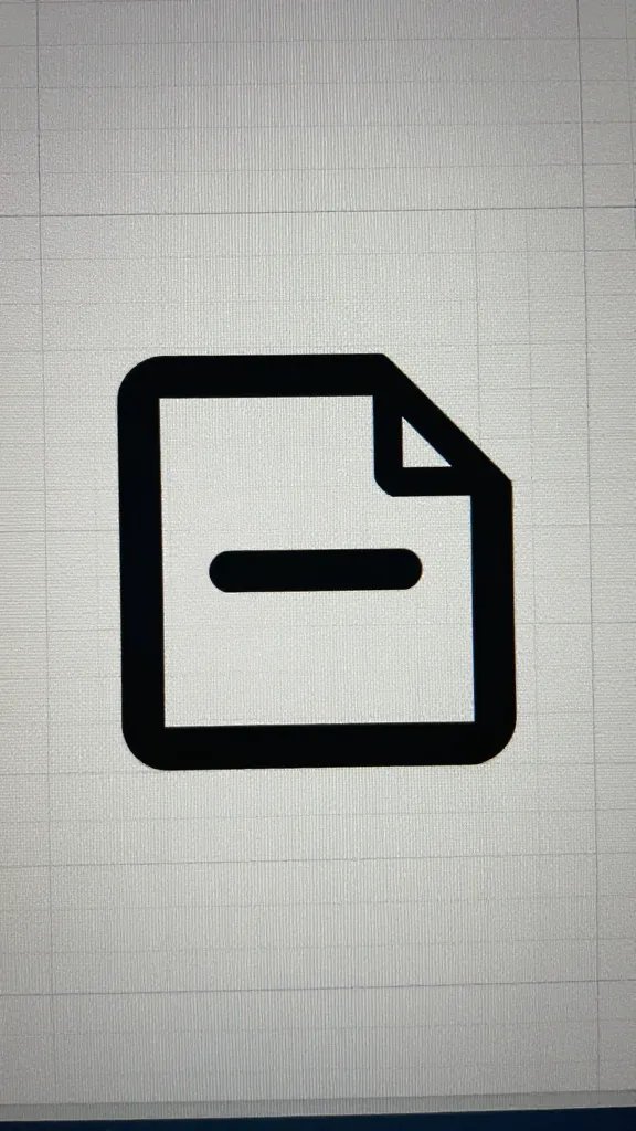 Closeup of a shiny vector file on a computer screen with grid background