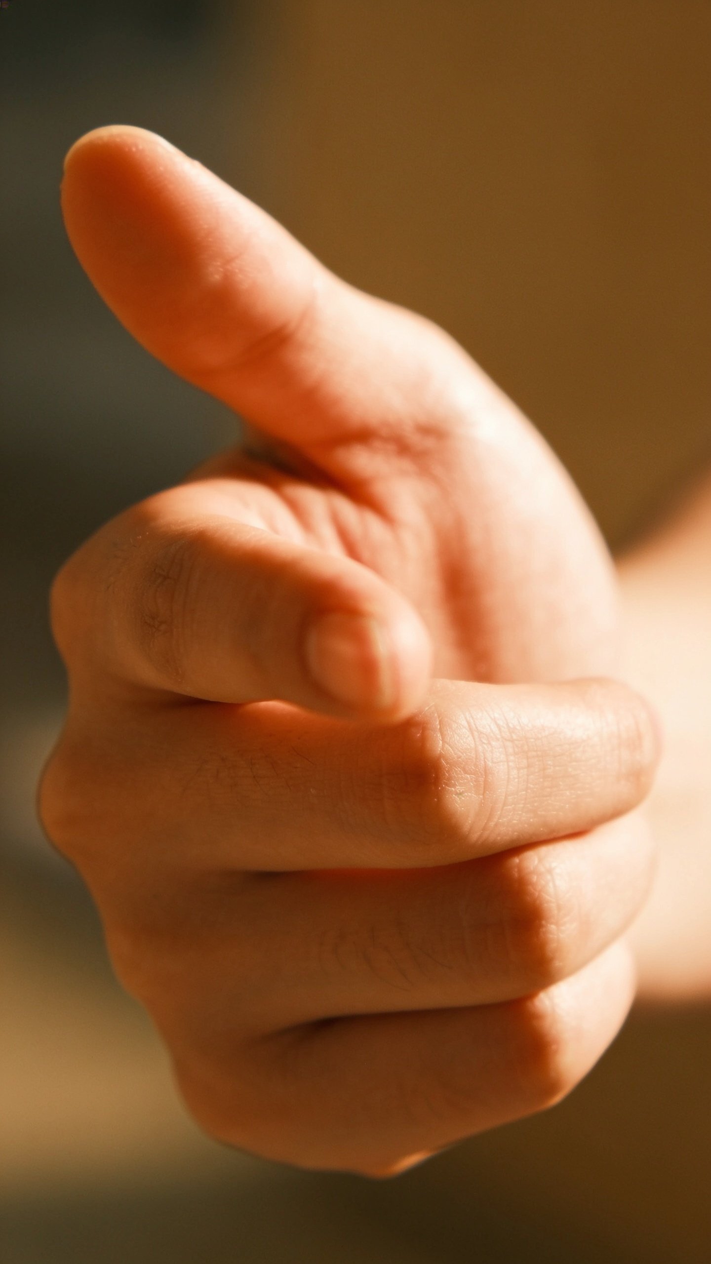 closeup of a single character’s hand gesture guiding the reader