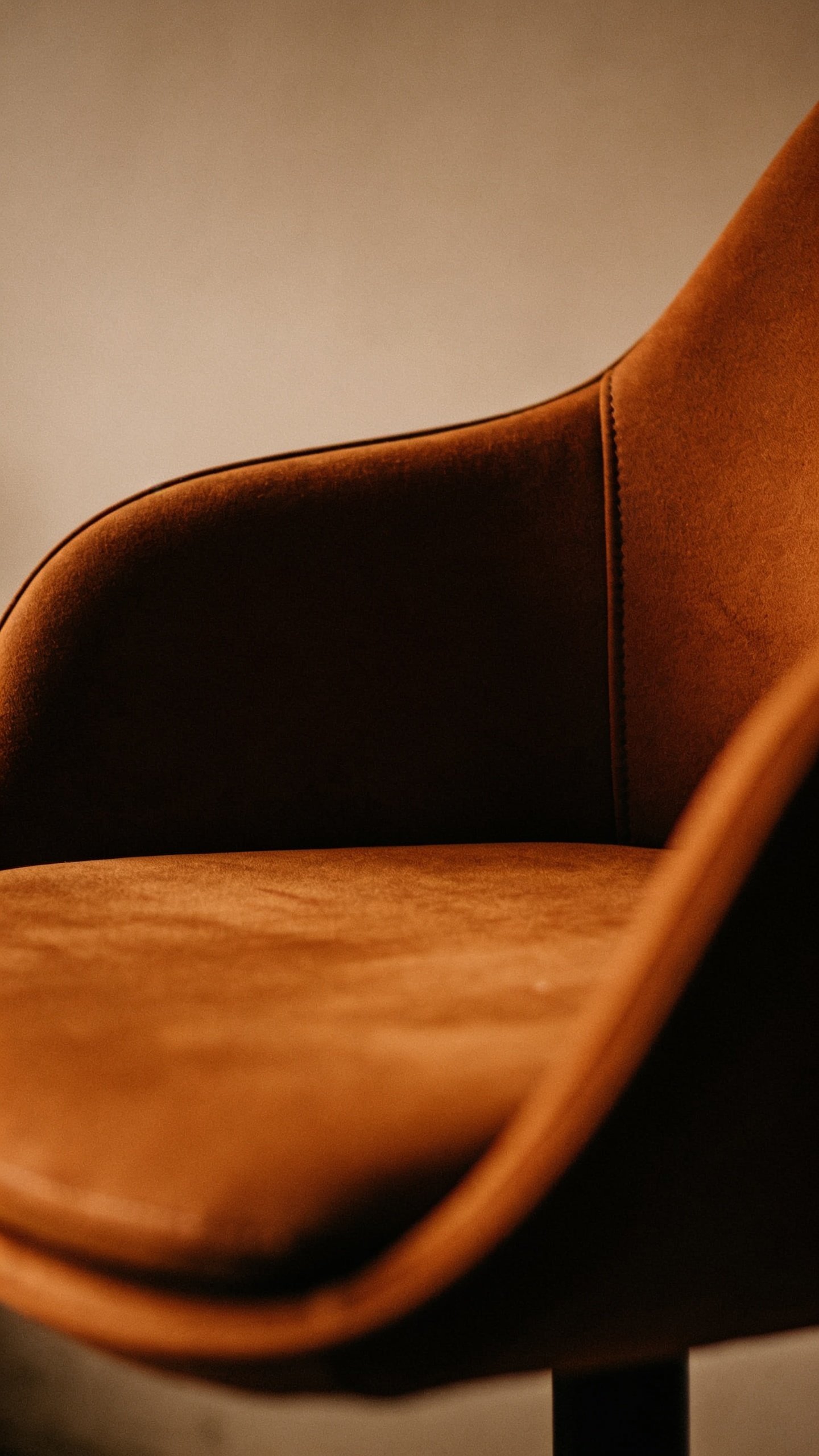 closeup of a single color-mood chair as a visual narrative anchor